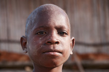 little boy in Korowai area, West Papua